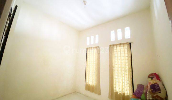 4br Unfurnished House At Pesona Cinangka Asri Sawangan By Travelio Realty 10