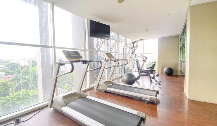 Studio Furnished Apartemen Bellevue Suites By Travelio 2