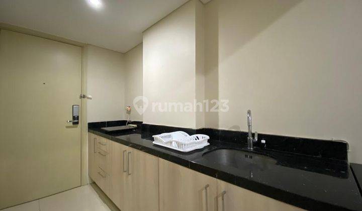 Studio Furnished Apartment At Warhol Residences By Travelio 8