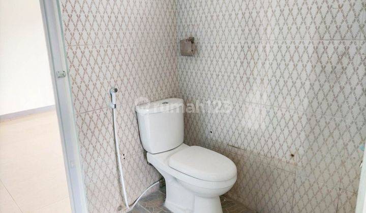 2br Unfurnished House At H. Saanan Kembangan By Travelio Realty 9