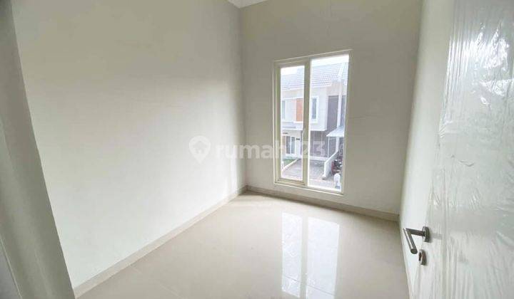 2br 3br 4br House At Puri Surya Jaya By Travelio Realty 9
