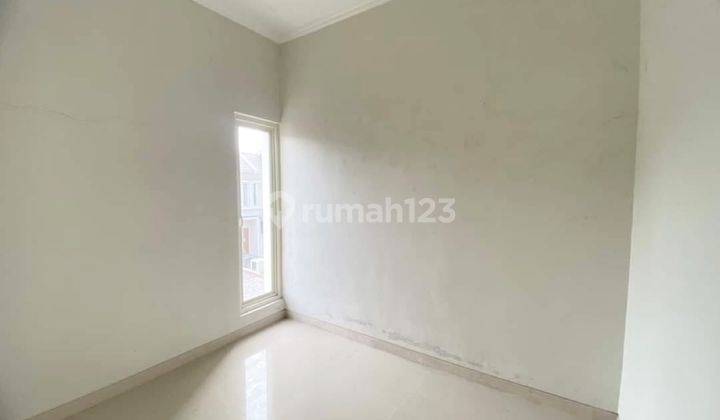2br 3br 4br House At Puri Surya Jaya By Travelio Realty 10