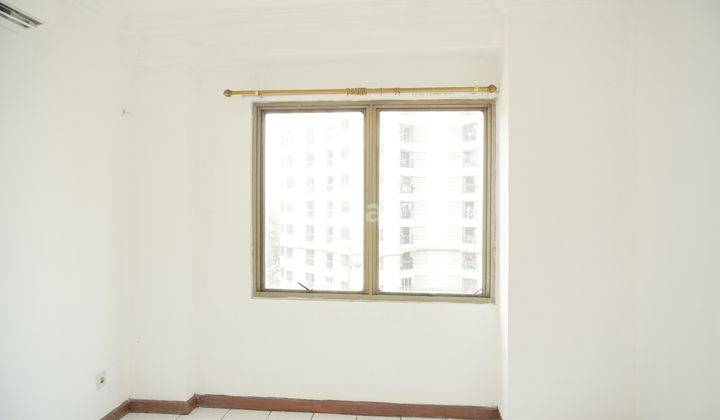 2BR Unfurnished Apartemen Taman Kemayoran Condominium 2