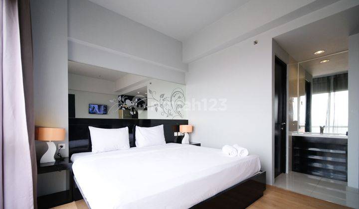 Studio Furnished Apartemen Grand Darmo Suite 2