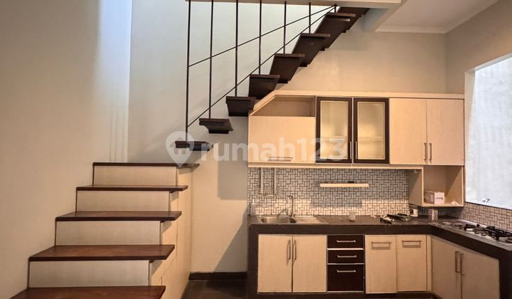 For Rent 1-Story House in Front of Garden Semi-Furnished at De Latinos BSD