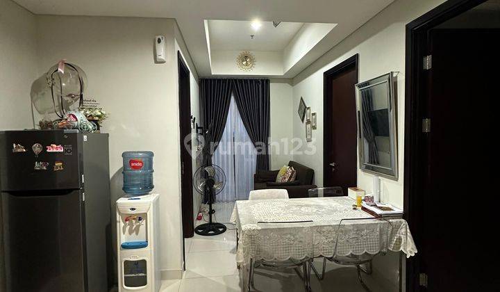 Apartemen Puri Mansion,Crystal, Lantai rendah, pool view, furnish 1