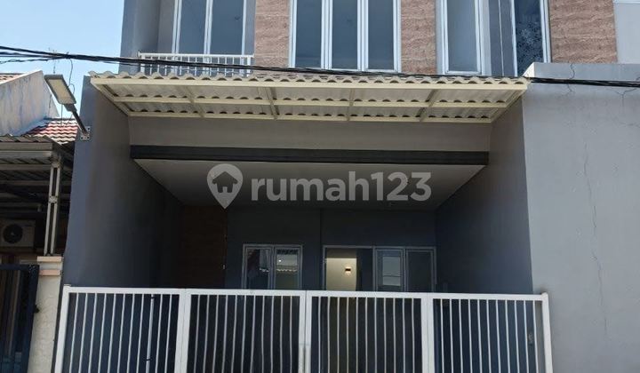 Rumah Gress 2 Lantai SHM di Cluster Mangga Pondok Tjandra TES