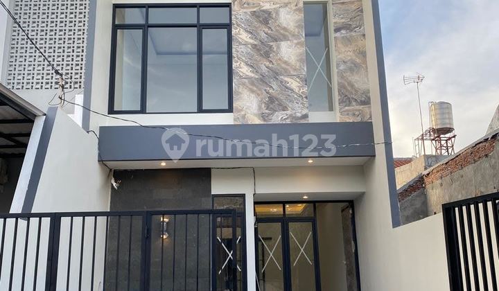 Rumah Baru Modern Minimalis 2 Lt SHM di Rungkut Mapan AD 97