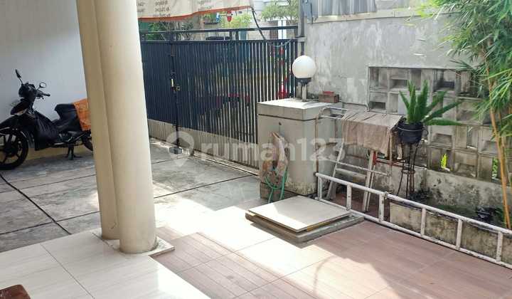 Rumah Terawat Strategis  Depan Taman di Puri Surya Jaya Sidoarjo 2