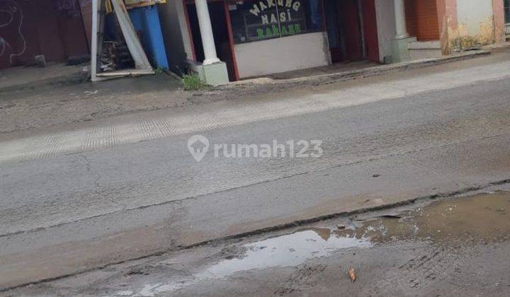 rumah pinggir jl raya  cocok untuk usaha  1