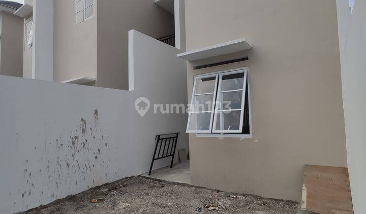 RUMAH MURAH  SIAP HUNI 2 LANTAI DEKAT UNPAM & WALIKOTA 14