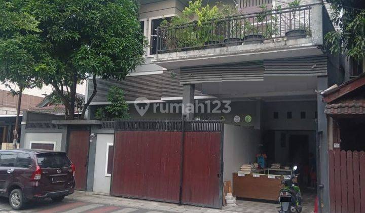 Rumah renovasi 2 lantai Griya Loka raya 1