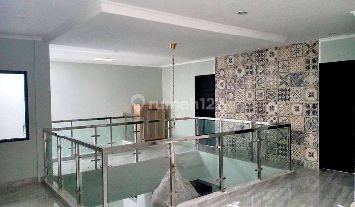 9x15 Mewah Rumah 3  Lantai Lokasi Favorit Puri Jakarta Barat  1