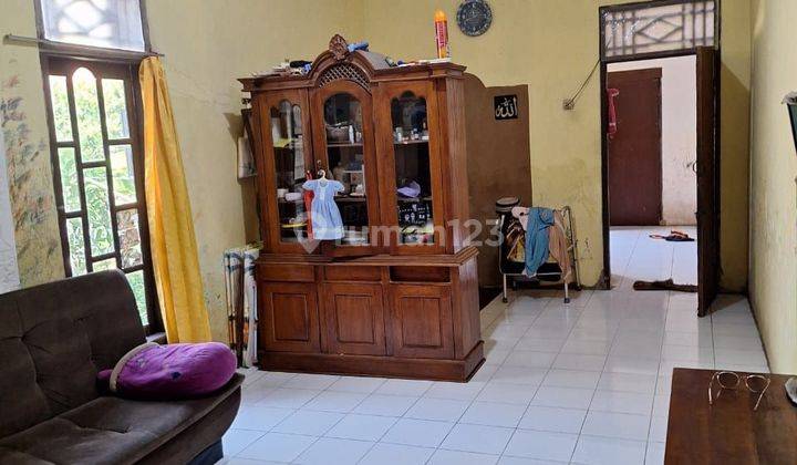 Rumah Pinggir Jalan Raya 2