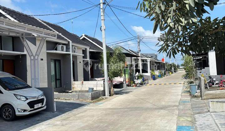 Over Kredit Tanpa BI Checking Rumah Cluster Kuta 1