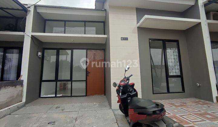 OVER KREDIT CLUSTER KUTA GRIYA ARTHA SUKASARI 1