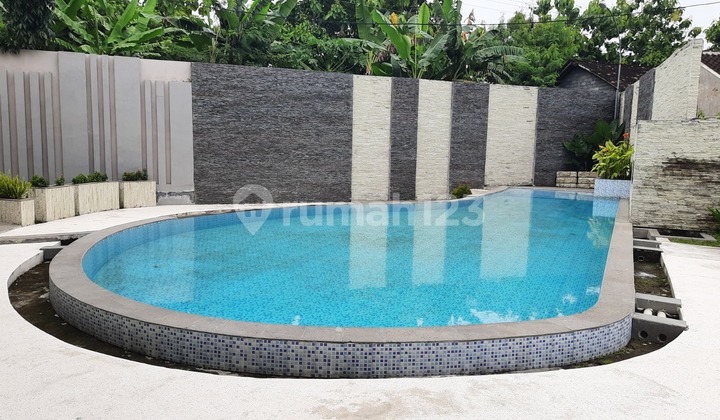 RUMAH 3 JUTAAN FREE KANOPI DENGAN FASILITAS KOLAM RENANG 2