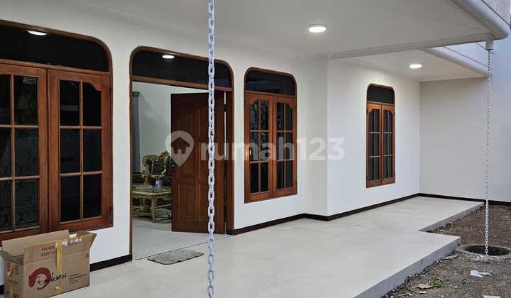 RUMAH DI JALAN DHARMAHUSADA INDAH SURABAYA 1