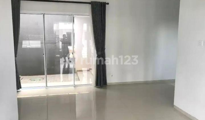 Ready-to-Occupy, Neat and Well-Maintained House in One Gate Discovery Cluster, Bintaro