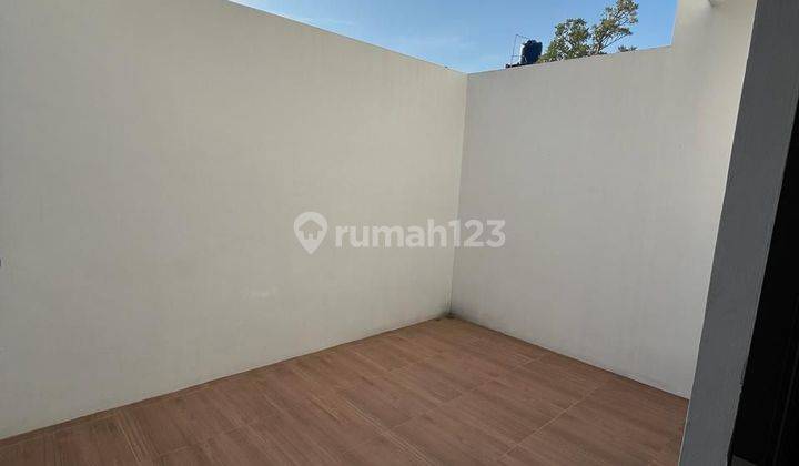 Rumah Minimalis Cantik dengan Lokasi yang sangat Strategis  2