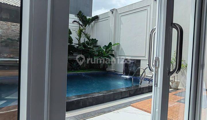 RUMAH MEWAH BONUS KOLAM RENANG DEKAT ISLAMIC CENTER MANYARAN 2