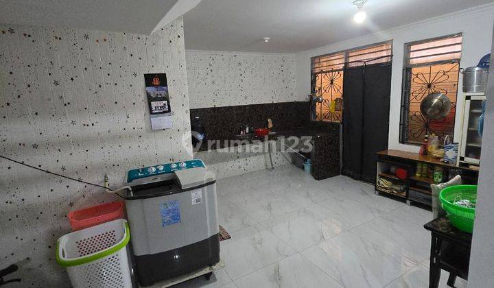 ruang tamu rumah hitung tanah di komplek