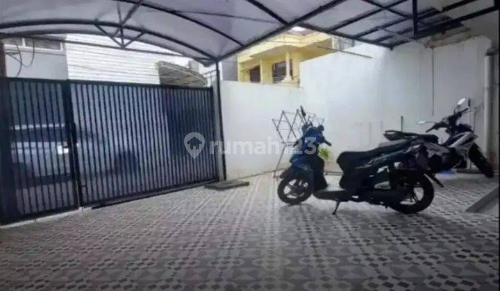 garasi/carport rumah hitung tanah di komplek