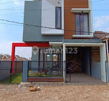 S119 Dijual Rumah Semi Furnish Desain Open Space House di Brawijaya Residence Malang 1