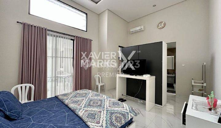 T015 Rumah Mewah di semi Premium di Greenwood Golf Araya 2