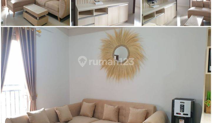 ruang tamu apartemen trans park juanda 2