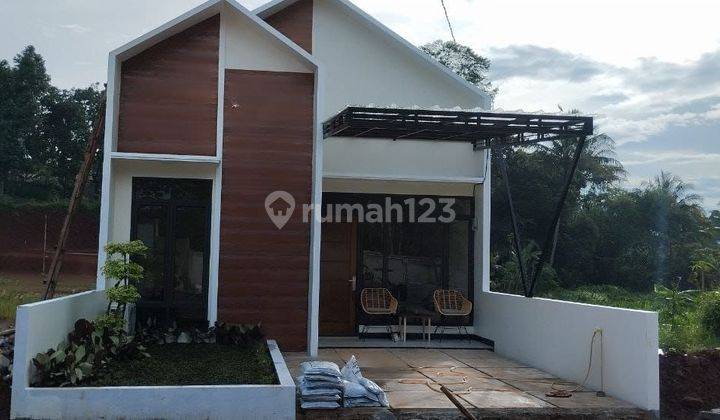 Rumah cantik  dekat perkantoran Pemda dan stasiun bebas banjir lokasi samping jalan Bomang 1