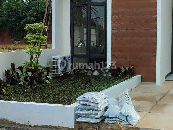 Rumah cantik  dekat perkantoran Pemda dan stasiun bebas banjir lokasi samping jalan Bomang 2