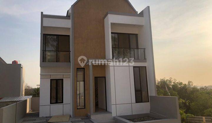 Rumah Modern Keluarga Minimalis 2 Lantai Di Gamping 1