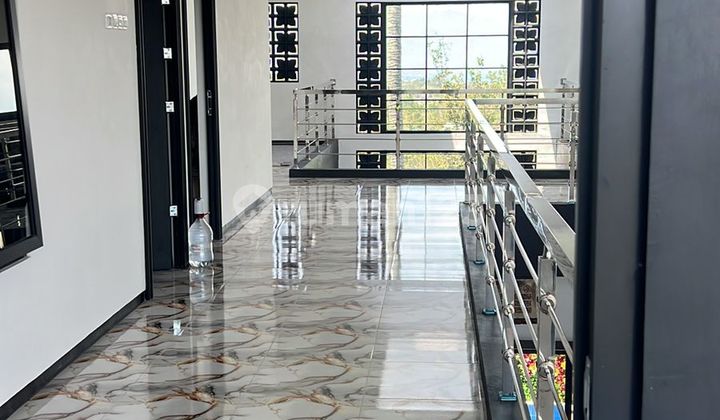 Luxury villa house with rooftop and private pool near Batu tourist attractions.