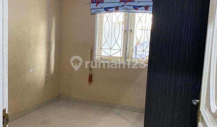 Rumah di Taman Palem Lestari,Uk 8x15m,2.5 lantai,semi furnish,Shm,Harga:3.3 M nego 2