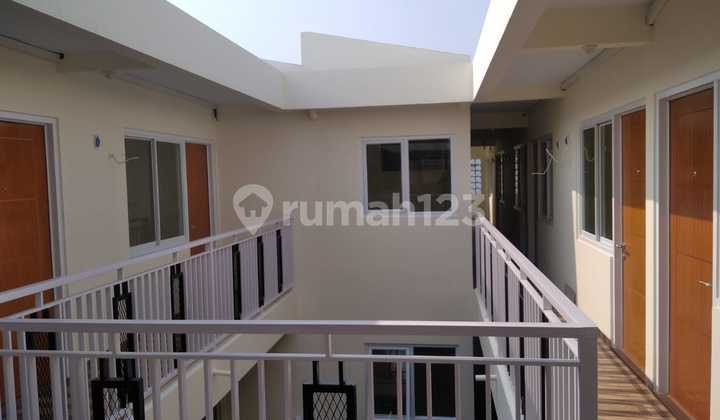 For Sale 4-Story Boarding House in Kukusan Depok with 54 Rooms // 10.25 2