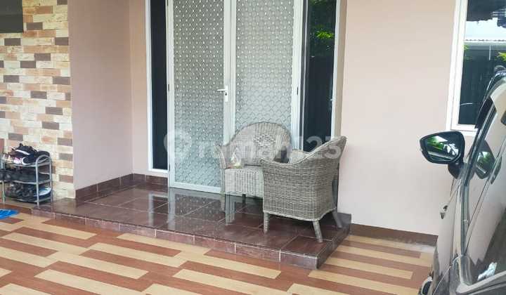 Jual cepat rumah dalam cluster di harapan indah 1 bekasi