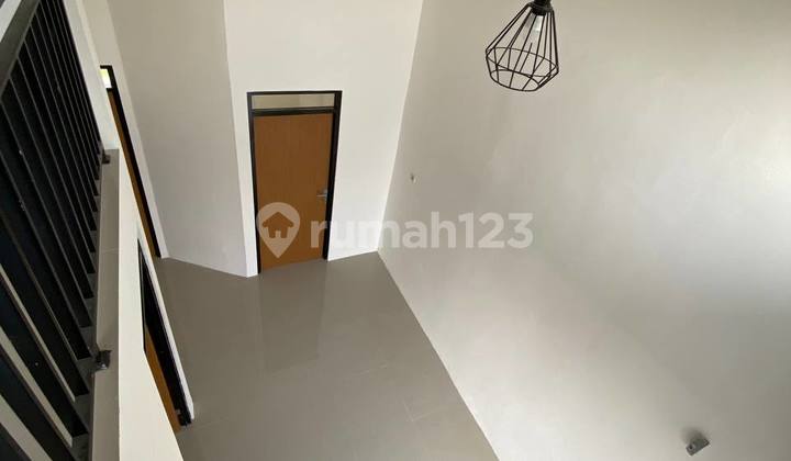Rumah baru Siap Huni 400jtan Konsep Mezzanine dan Balkon 10 Menit Stasiun 1