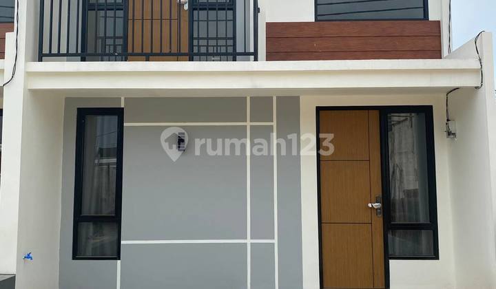 Rumah Baru Siap Huni Konsep mezzanine Dan Balkon 10 menit Stasiun 