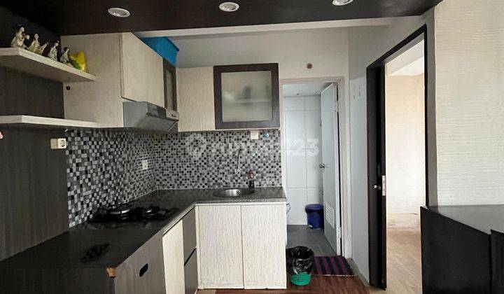 Apartemen Keluarga Nyaman Lantai Rendah Fully Furnished 1