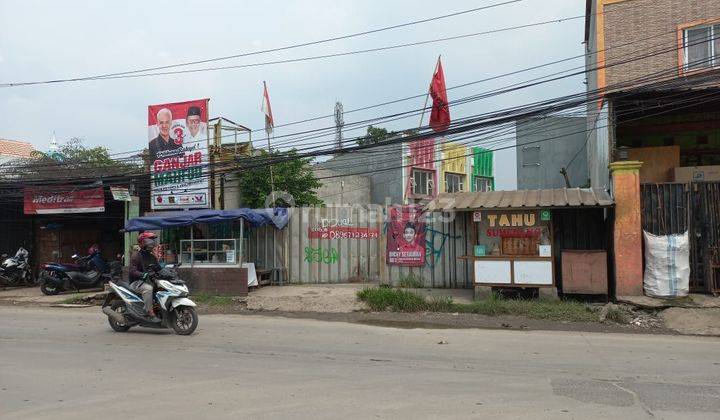 TANAH DI LEGOK LUAS 1000m2 INCLUDE BANGUNAN RUKO SHM PINGGIR JALAN RAYA 1