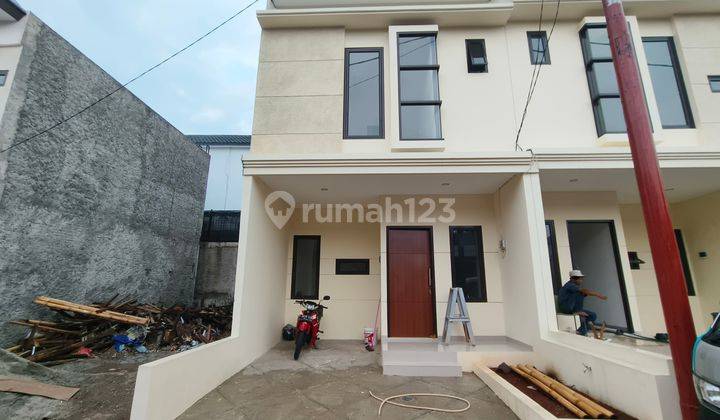 Rumah cantik minimalis asri cluster deket pintu tol Cibubur/halte busway cibubur junction 1