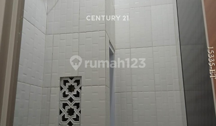 House for Quick Sale, Renovated, Has a Roof Top Inside the Housing Complex. 2