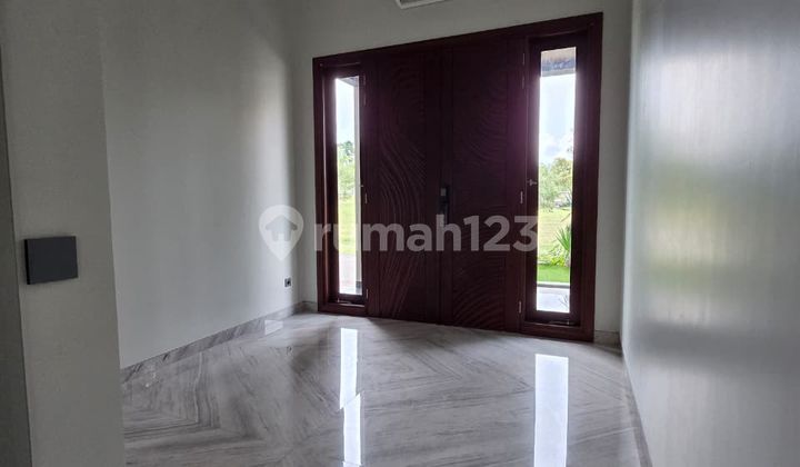 Rumah di Pakuwon Indah, Split Level 2.5 Lantai Minimalis Modern Barus Gress 2