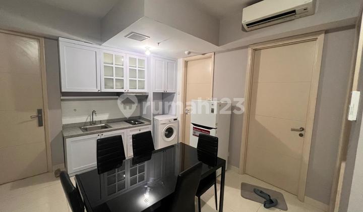 Furnished Apartment at La Riz Mansion Pakuwon 2 Bedroom with Pool View