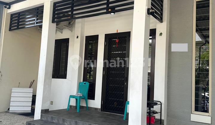 Bangunan 1,5 Lantai Rumah Citraland Taman Puspa Raya di Surabaya 