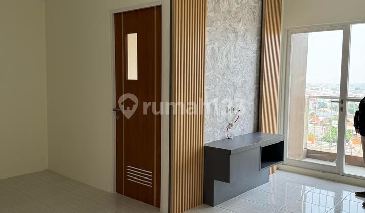 Apartemen Puncak Dharmahusada Tower C Type 2 BR, Pool View  2