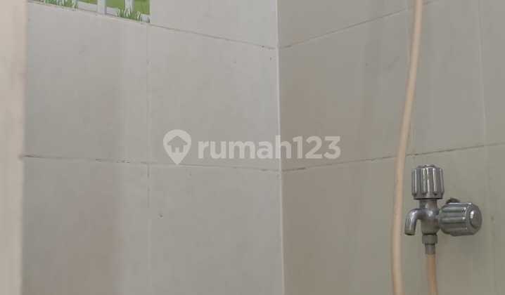 For Sale Ready-to-Live House in a Green and Quiet Environment at Darwin Cluster Gading Serpong. YYN EFAS 2