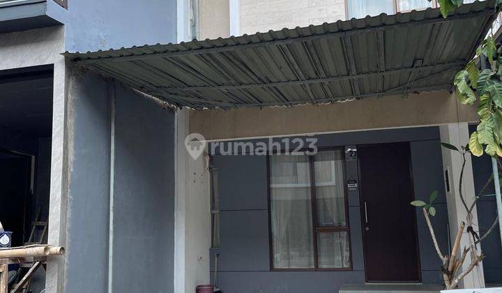 Rumah Semi furnished siap huni di Graha Raya 1