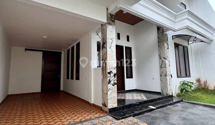 Rumah Modern Minimalis di PBI Araya Kota Malang 2